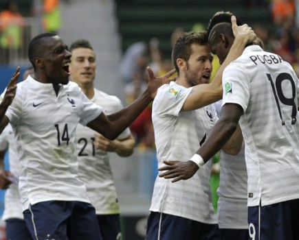 France celebrate Pogba's goal against Nigeria.