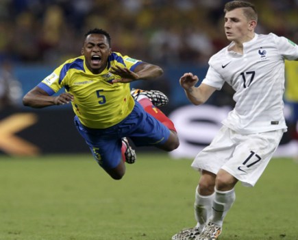 France's Lucas Digne trips Ecuador's Alex Ibarra