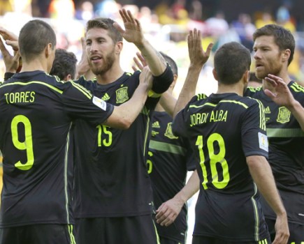 Spain celebrate against Australia