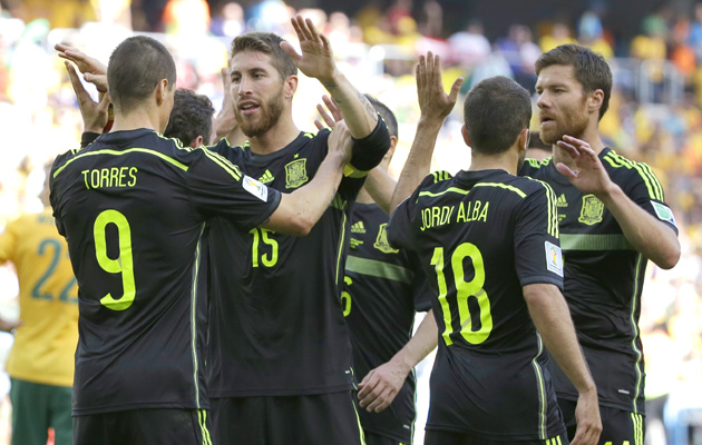 Spain celebrate against Australia