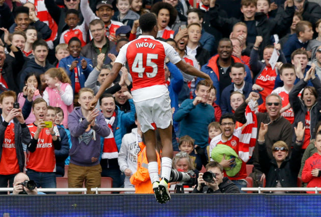 Wenger's record on promoting youth is poor. Alex Iwobi celebrates scoring against Watford